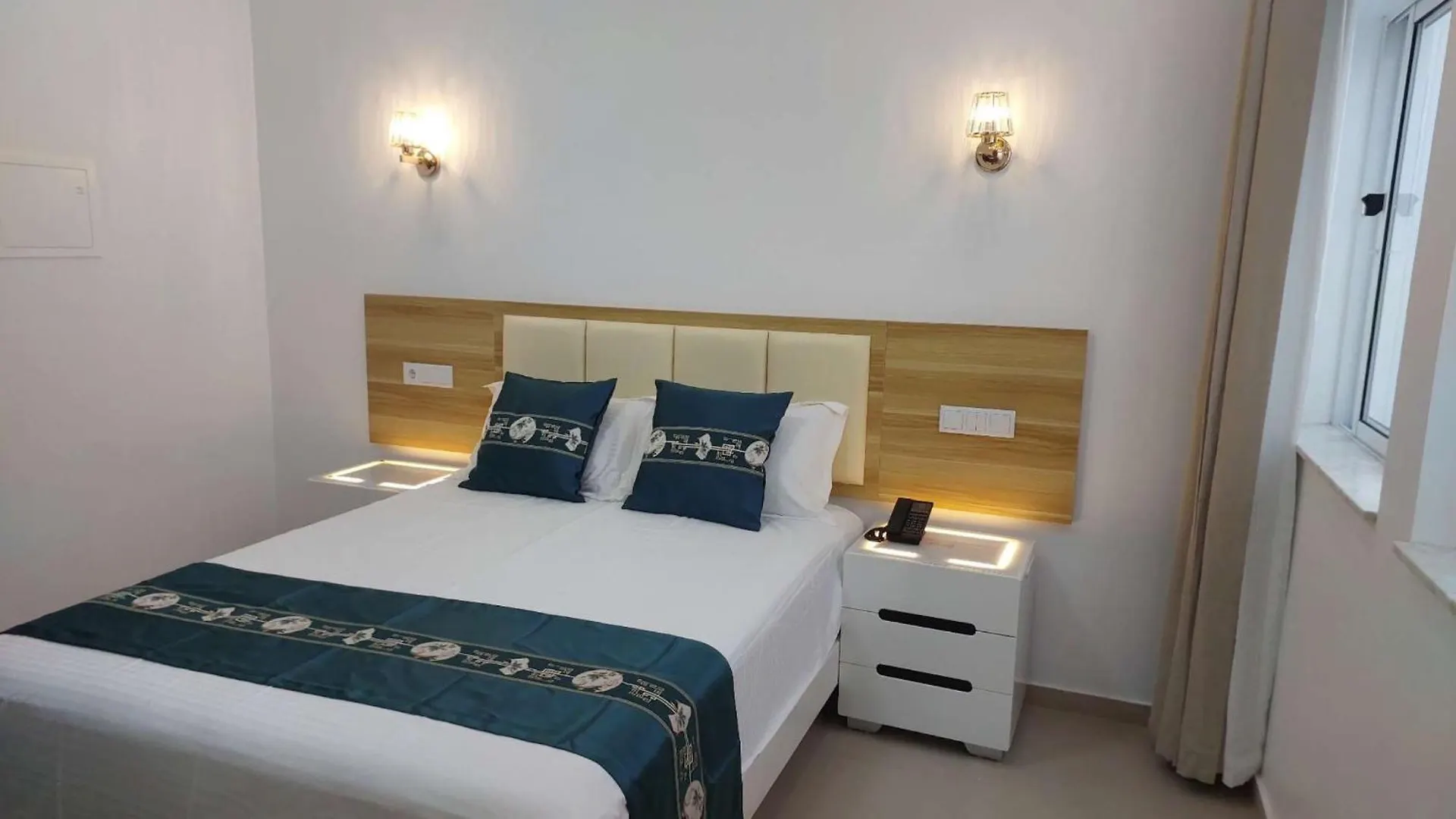 Lily Holiday Hotel 明德卢