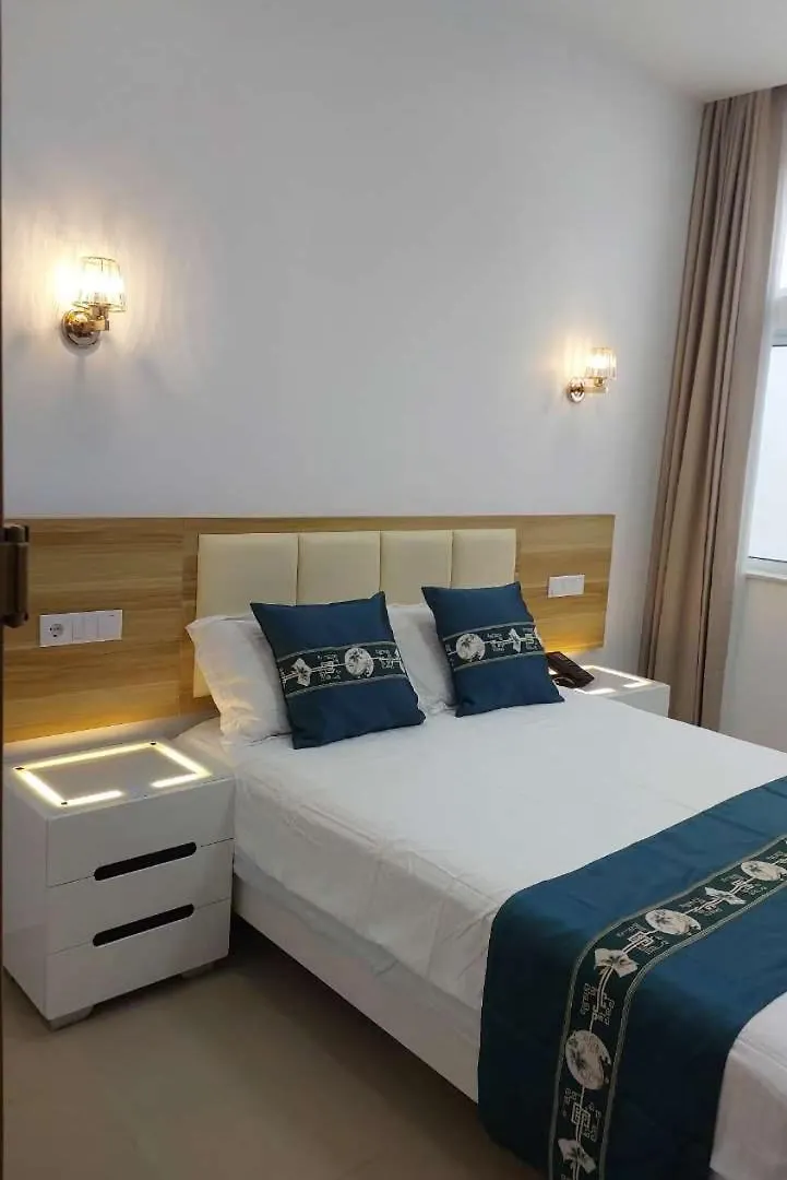 Lily Holiday Hotel 明德卢