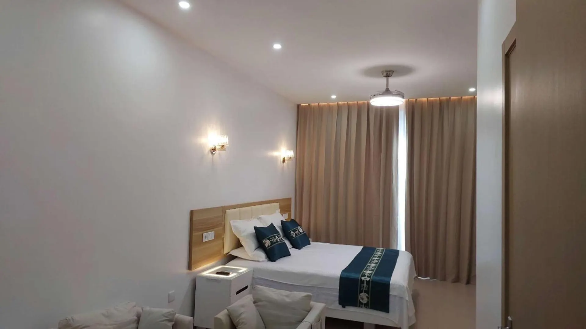 Lily Holiday Hotel 明德卢