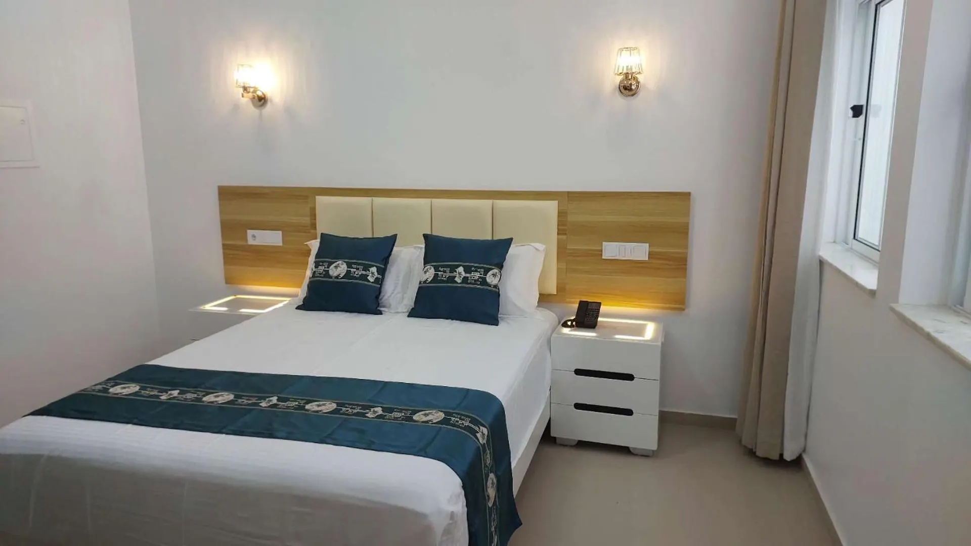 Lily Holiday Hotel 明德卢